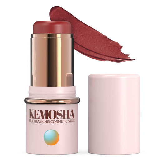 Rose gold cosmetic stick with a reddish-brown swatched color