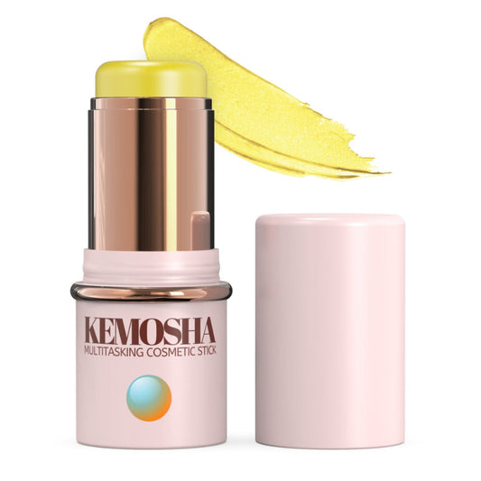 Yellow cosmetic stick with a rose gold applicator